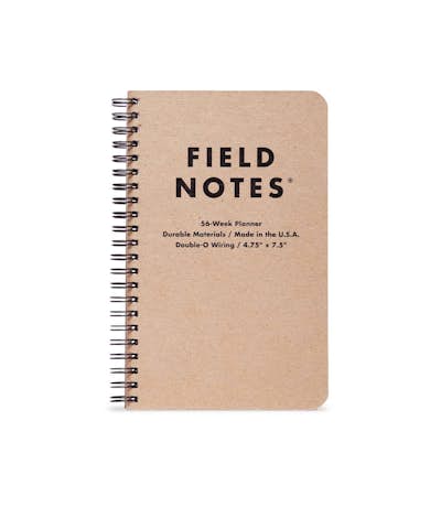 Front of the brown 56-Week Weekly Planner with left side spiral binding.