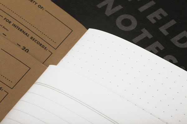 Close-up of the Pitch Black Memo Books’ inner pages, showing the ruled and dot-graph paper styles.