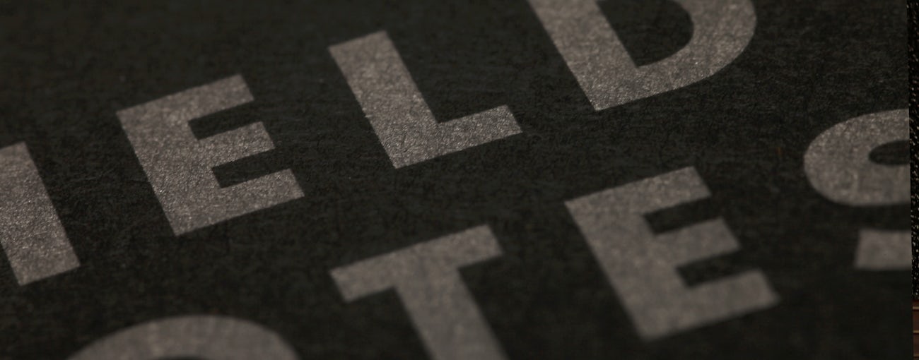 Close-up of the cover of the Pitch Black Memo Book.